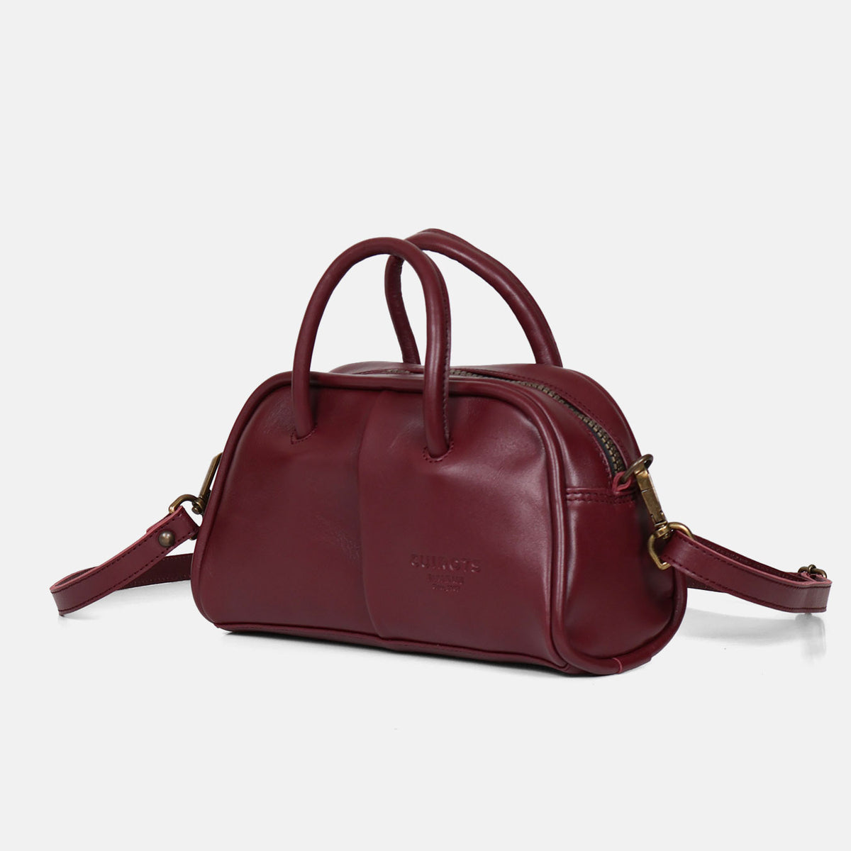 Bolso de mano y bandolera pequeño Classic de piel en color burdeos, vista lateral