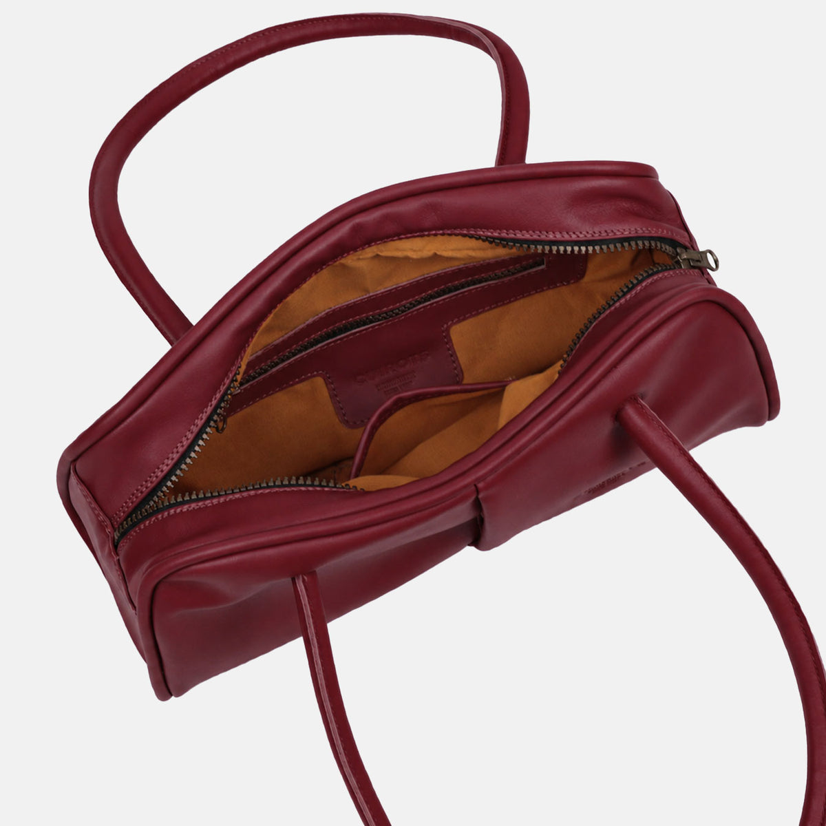 Bolso de hombro baguette Classic en color burdeos, abierto, con forro y bolsillo interior